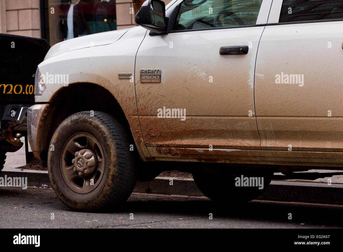 Muddy fender and door of pickup truck - USA Stock Photo