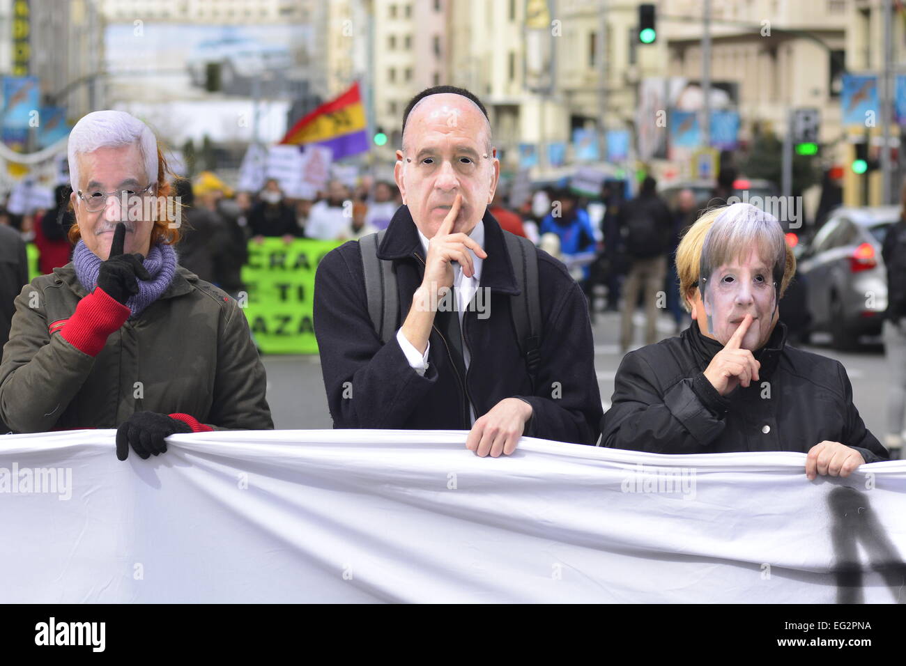 People wearing European politicians masks during a demonstration in