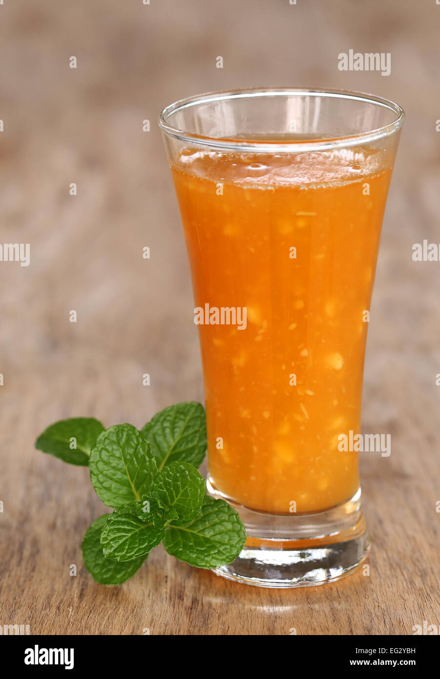 Medicinal 'wood appel' juice and mint leaves Stock Photo