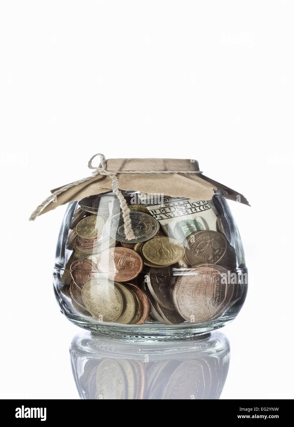 Close up view of container filled with coins on white back Stock Photo ...