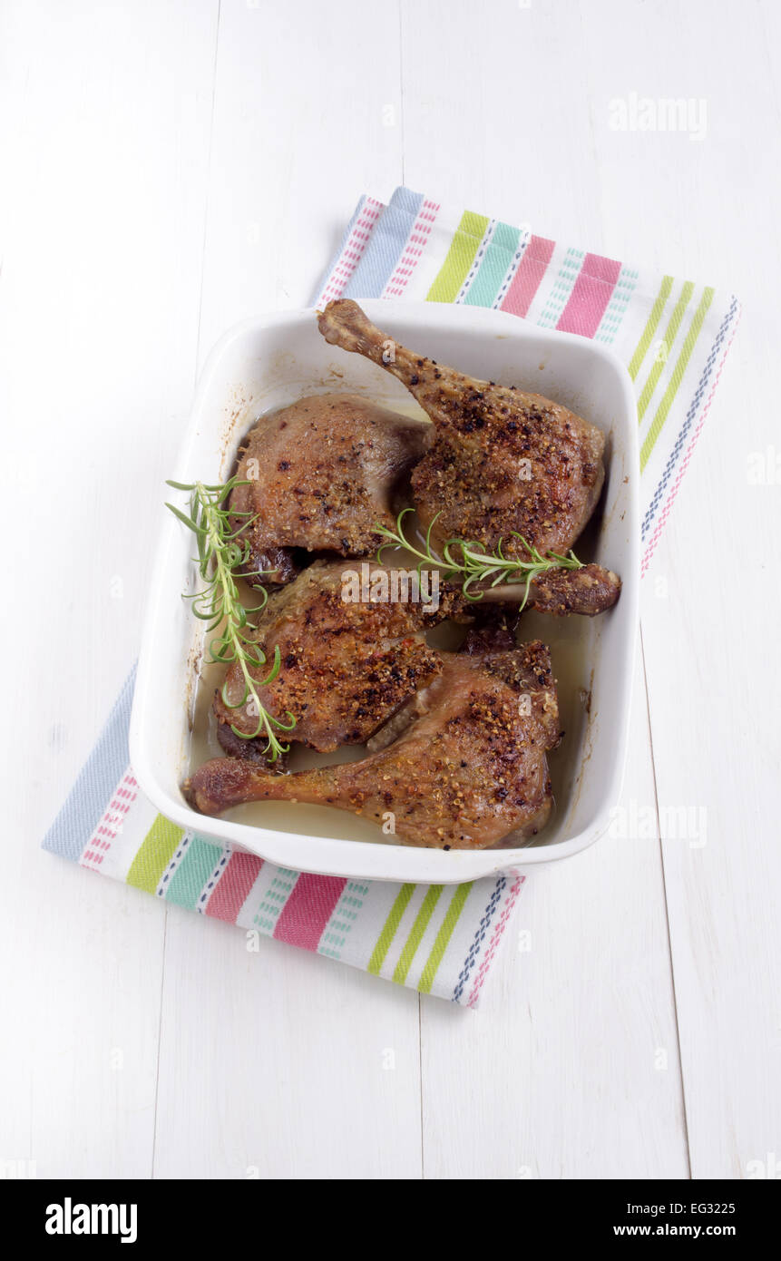 warm oven baked duck legs with rosemary Stock Photo - Alamy