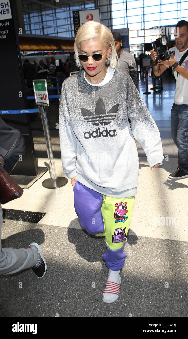Rita Ora arrives at Los Angeles International Airport (LAX) wearing an