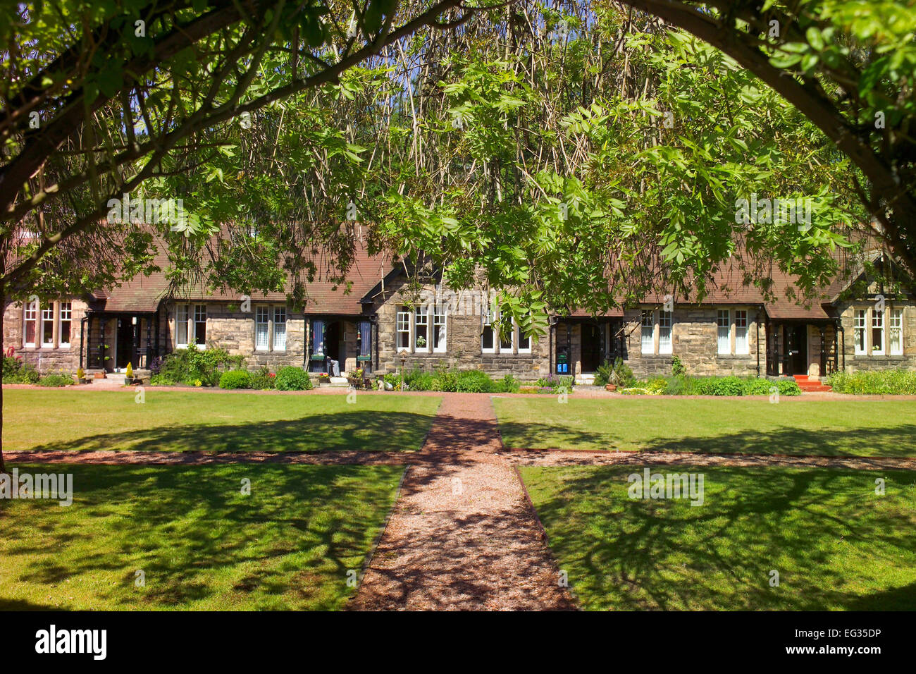 Armstrong Cottages, almshouses in Rothbury, Northumberland Stock Photo