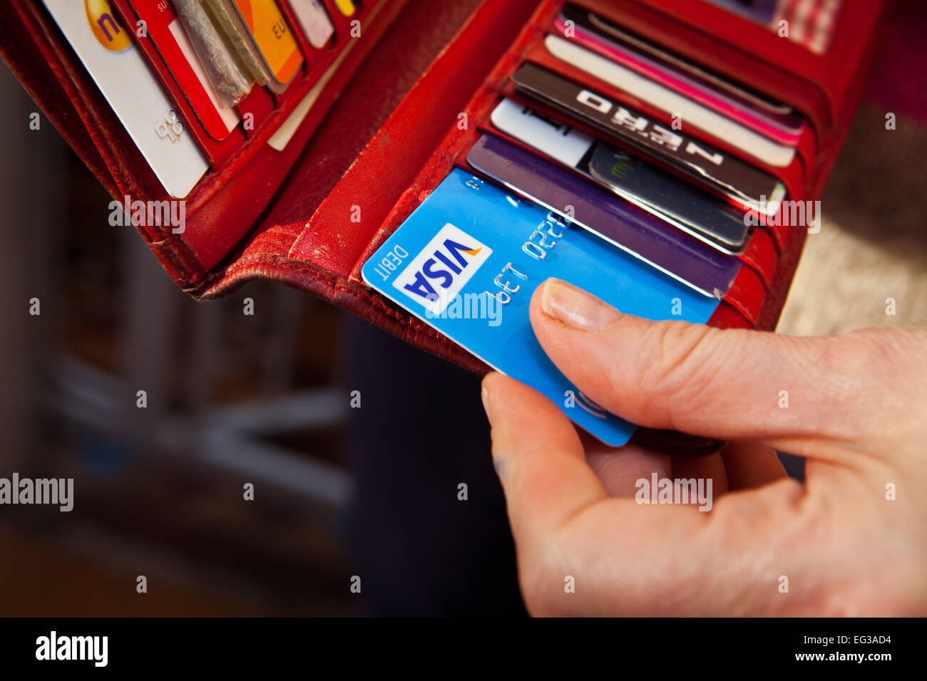 Visa Debit card in purse Stock Photo