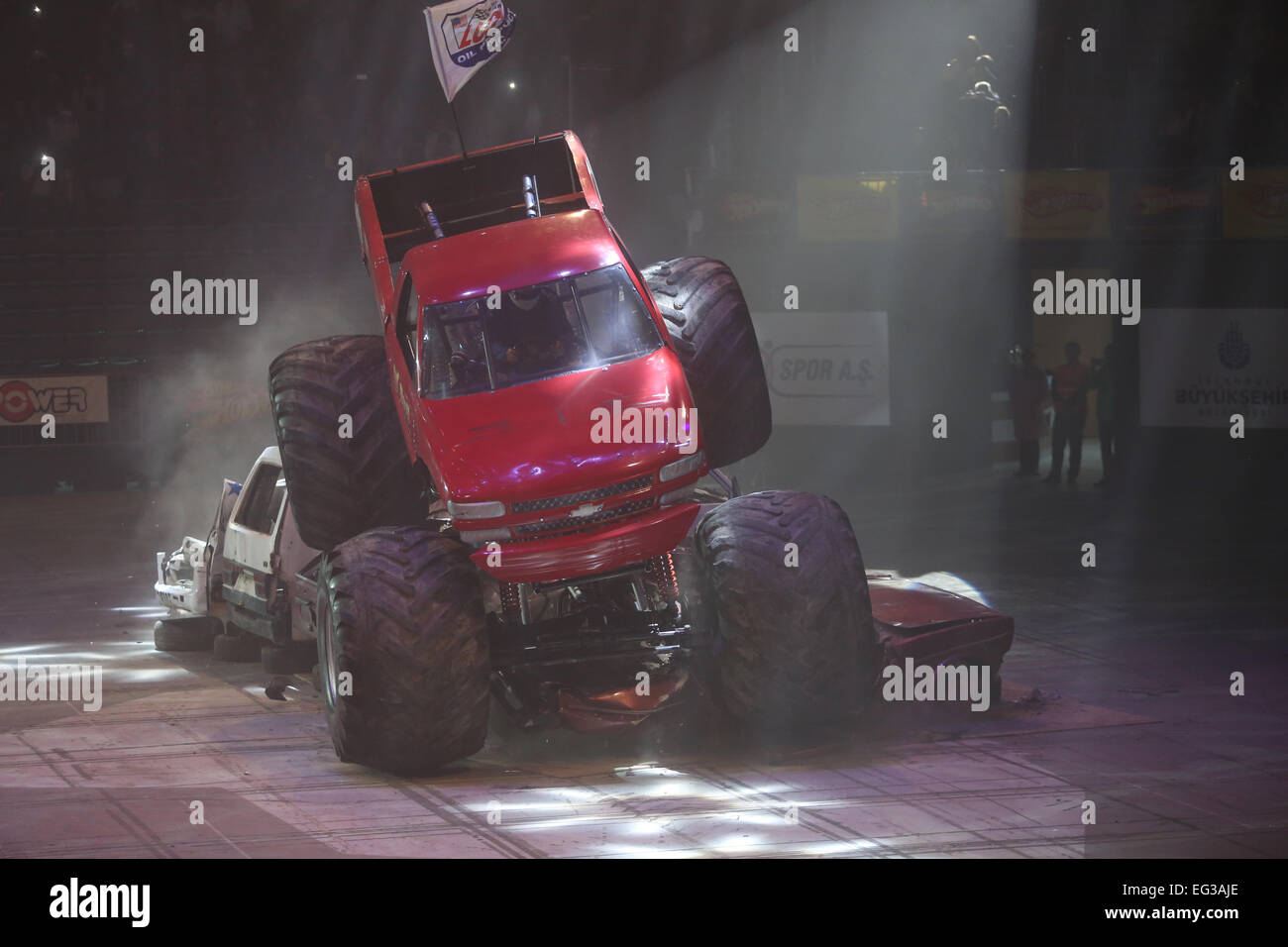 ISTANBUL, TURKEY - FEBRUARY 01, 2015: Monster Truck Lil Devil crush to old cars in Sinan Erdem Dome during Monster Hot Wheels st Stock Photo