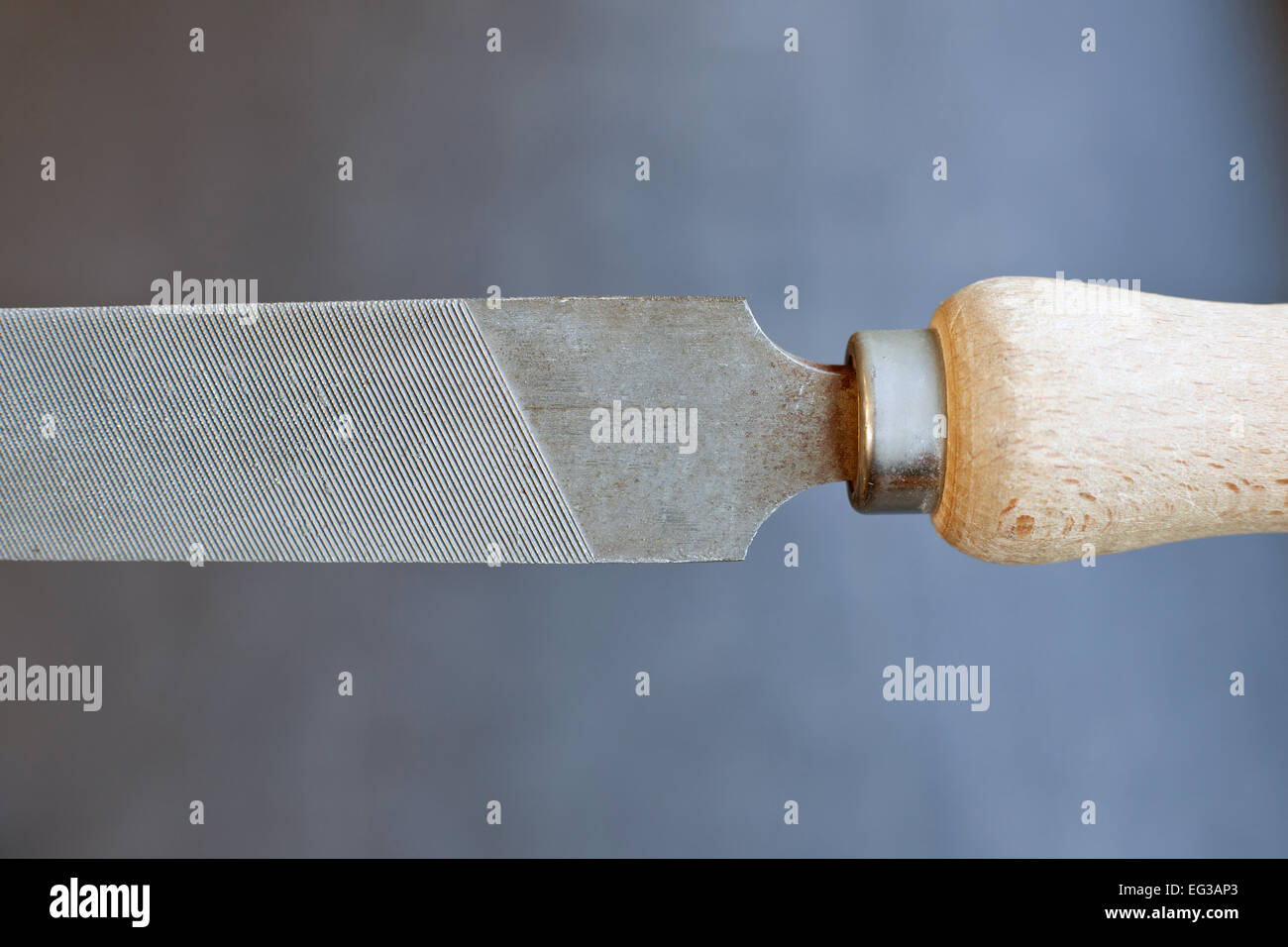 closeup of old fashioned file with wooden grip Stock Photo