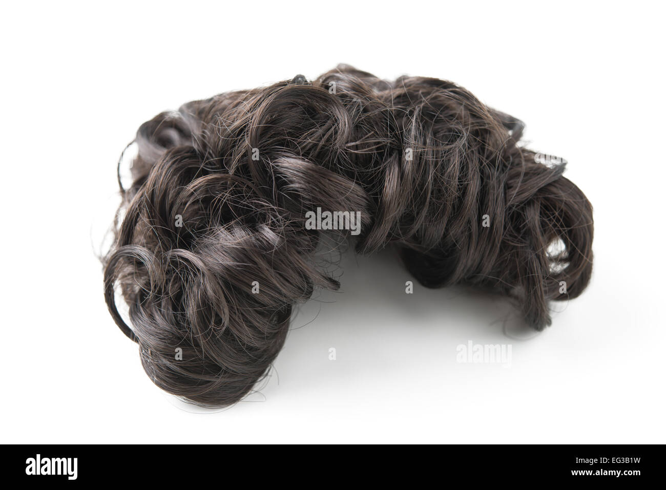 brown wig isolated on a white background Stock Photo