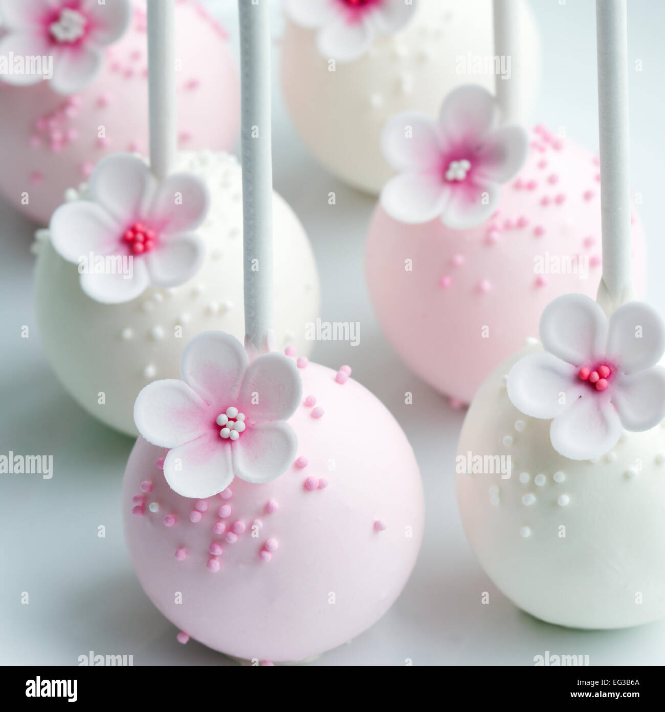 Wedding cake pops in pink and white Stock Photo - Alamy