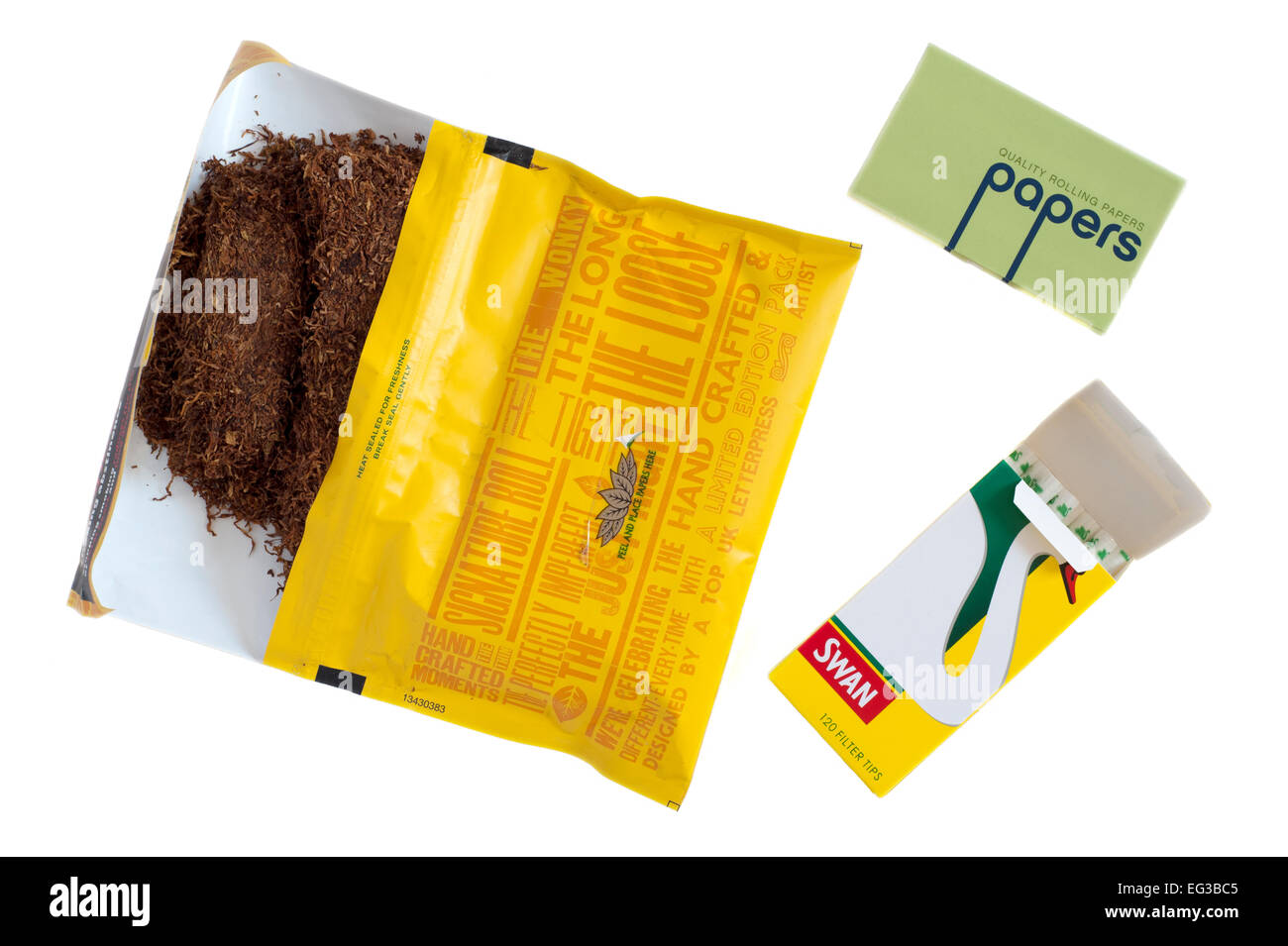 pouch of cigarette hand rolling tobacco with papers and filters on a white background Stock Photo - Alamy