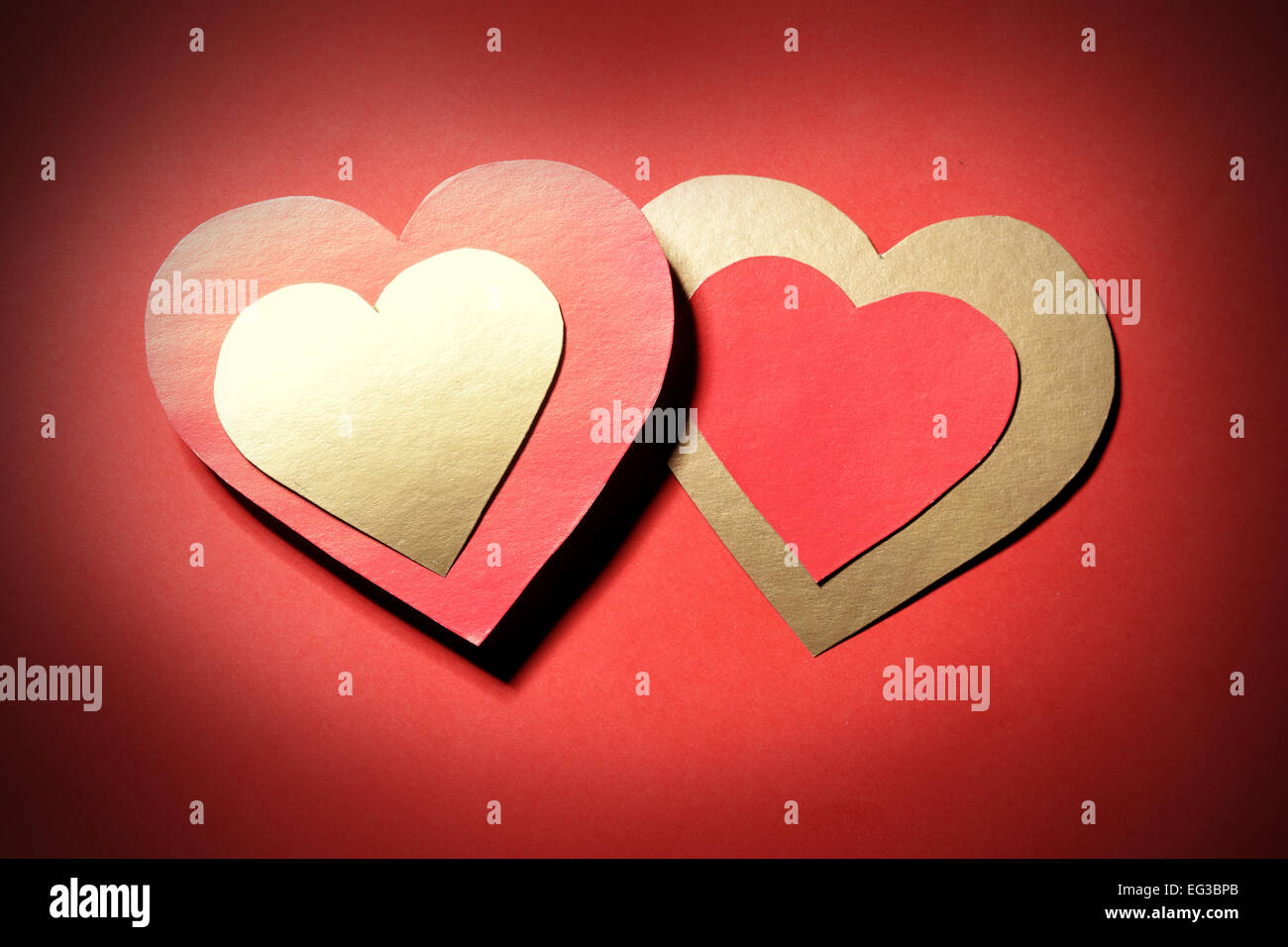 Love Two Paper Hearts Over Red Background Stock Photo Alamy