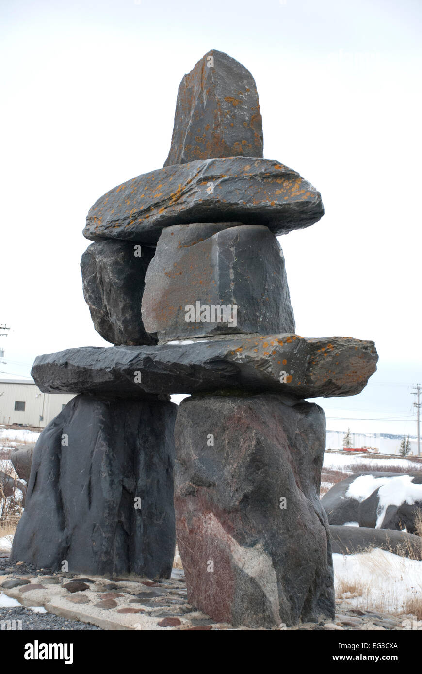 Inukshuk, a stone landmark or cairn built and used by the Inuit, Inupiat, Kalaallit, Yupik, and other peoples of the Arctic Stock Photo