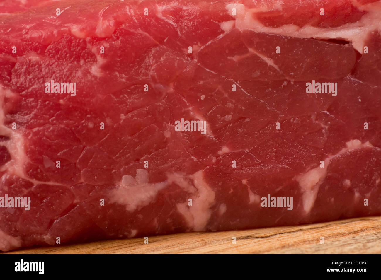 Marbled sirloin strip steak raw closeup Stock Photo
