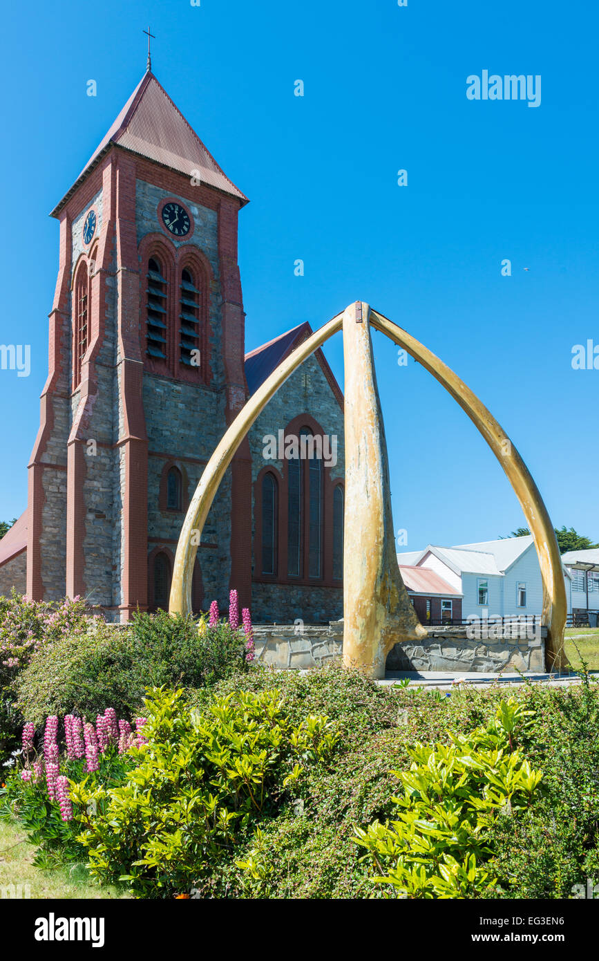 Christ Church cathedral, with whalebone arch, Ross Road, Stanley, Falkland Islands - summertime Stock Photo