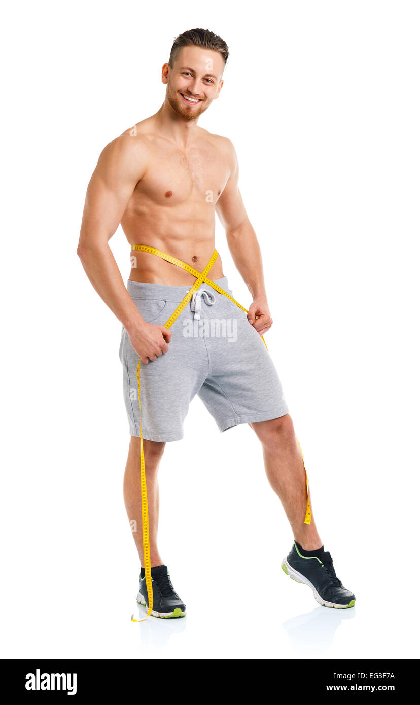 Sport man with measuring tape on the white background Stock Photo