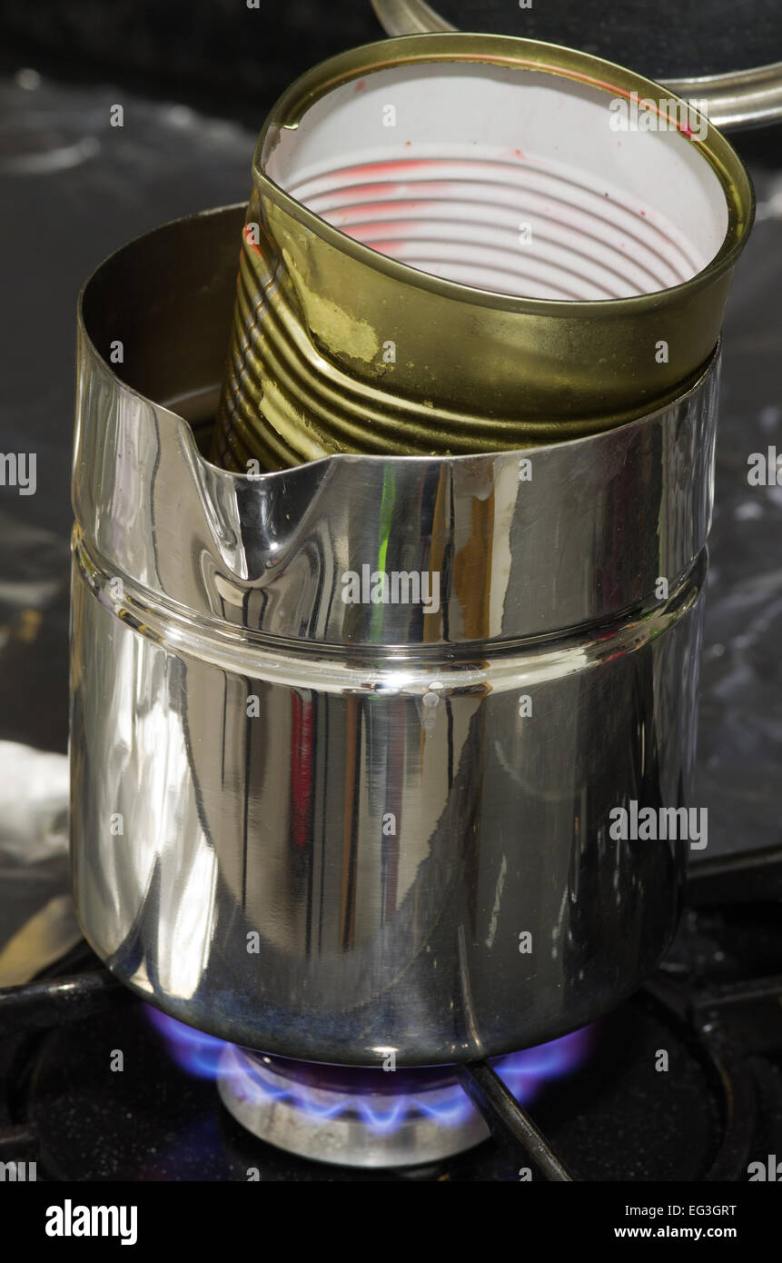 Melting wax in water bath craft candles series Stock Photo Alamy