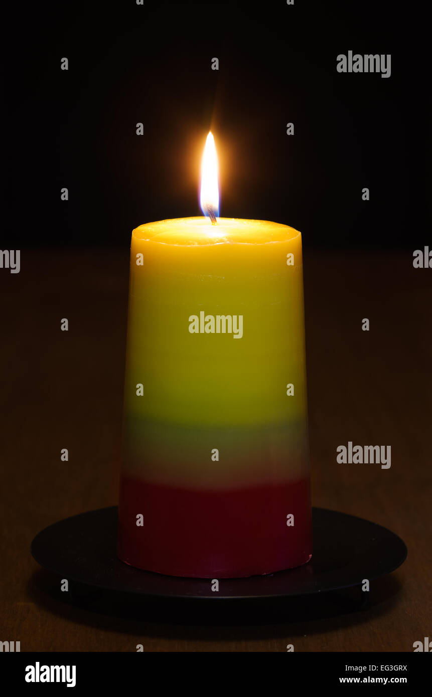 Candle lit in the dark craft candles series Stock Photo Alamy
