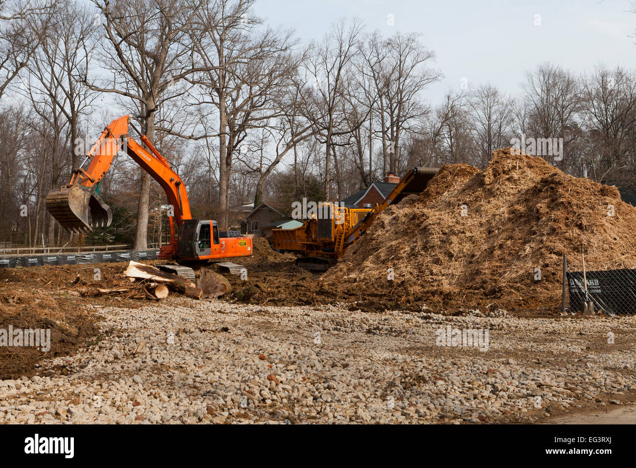 Wood prepared and mulched for recycling at new home construction lot - USA Stock Photo