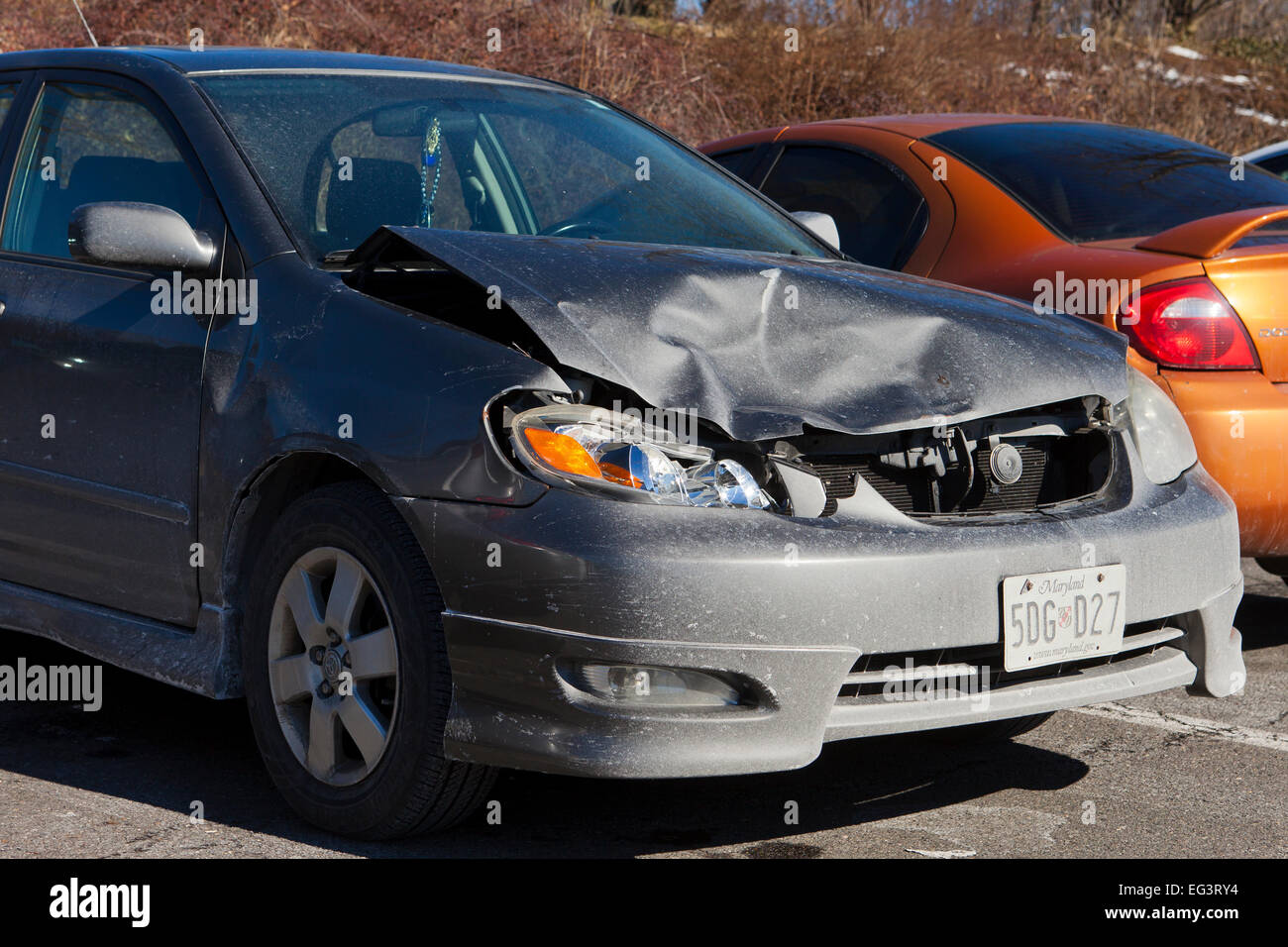Compact car with frontal collision damage - Maryland USA Stock Photo