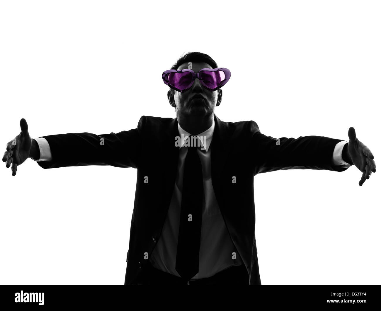 one caucasian business man loving with funny glasses in silhouette on white background Stock Photo