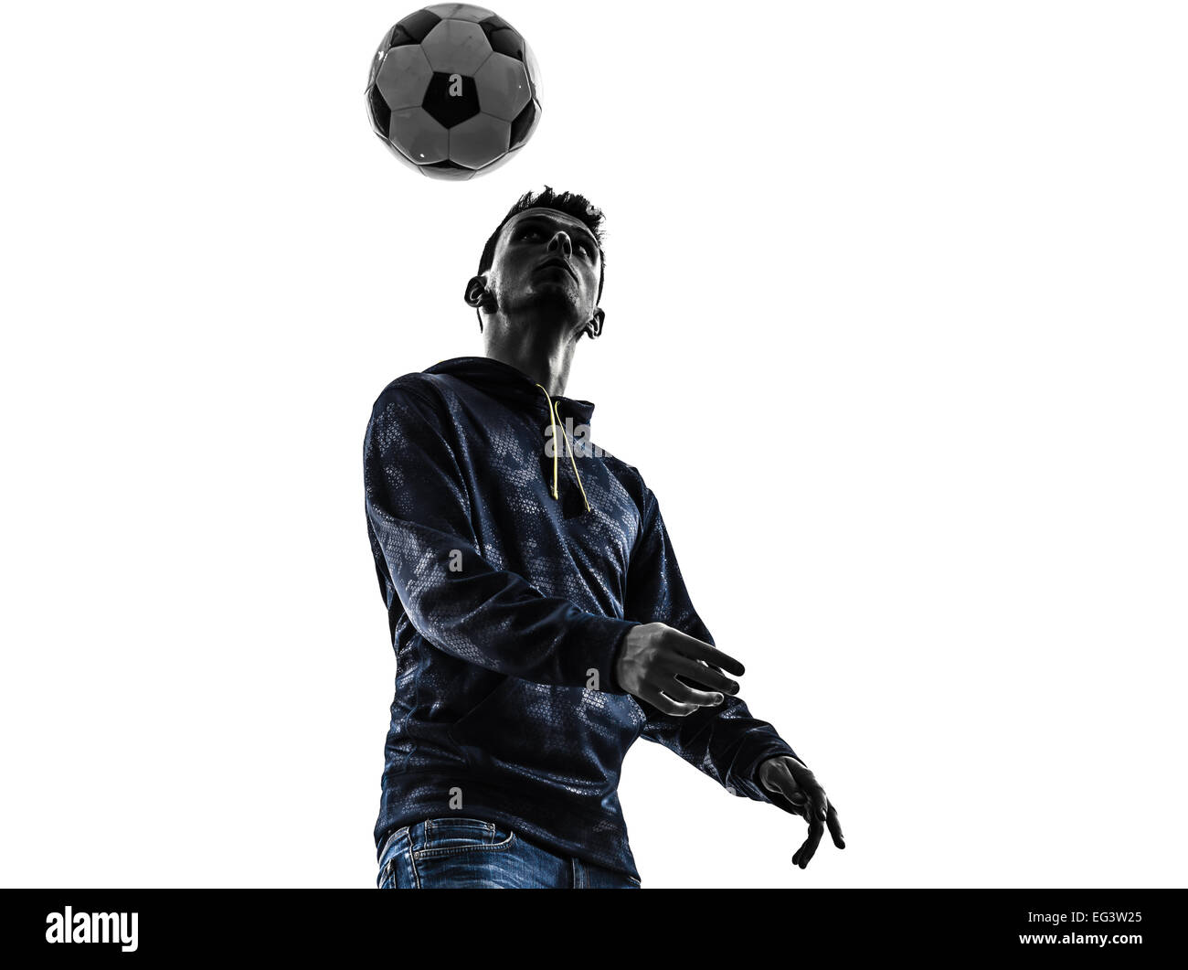 one young man soccer freestyler player in silhouette on white