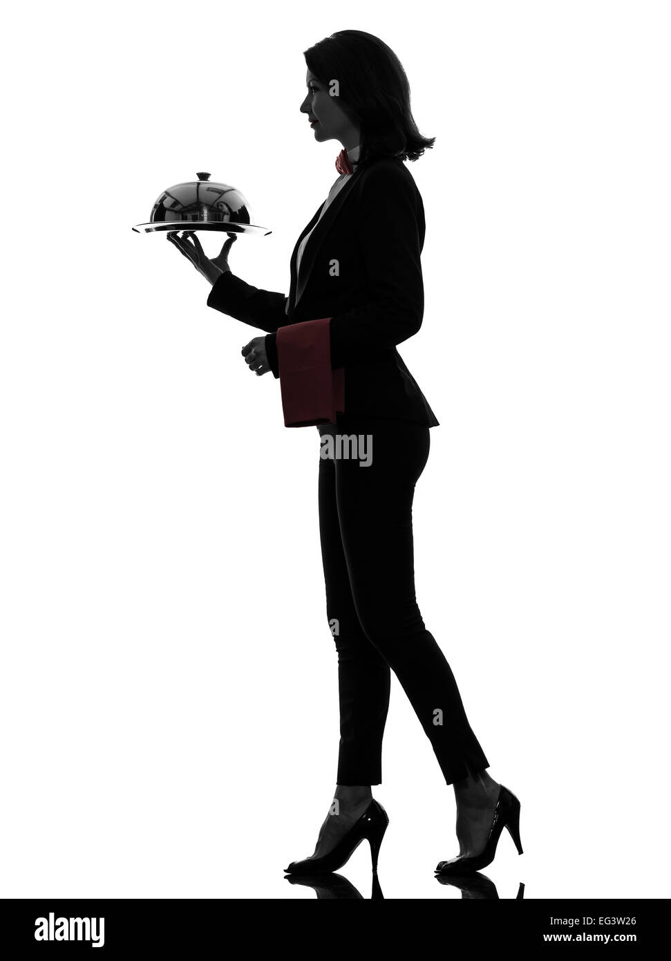 one  woman waiter butler serving dinner with catering dome in silhouette on white background Stock Photo