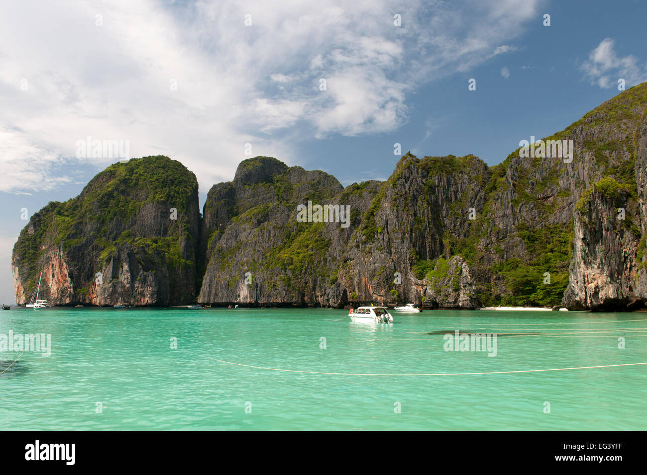 Tourist boats in Maya Bay, Koh Phi Phi Ley island, Thailand. Stock Photo