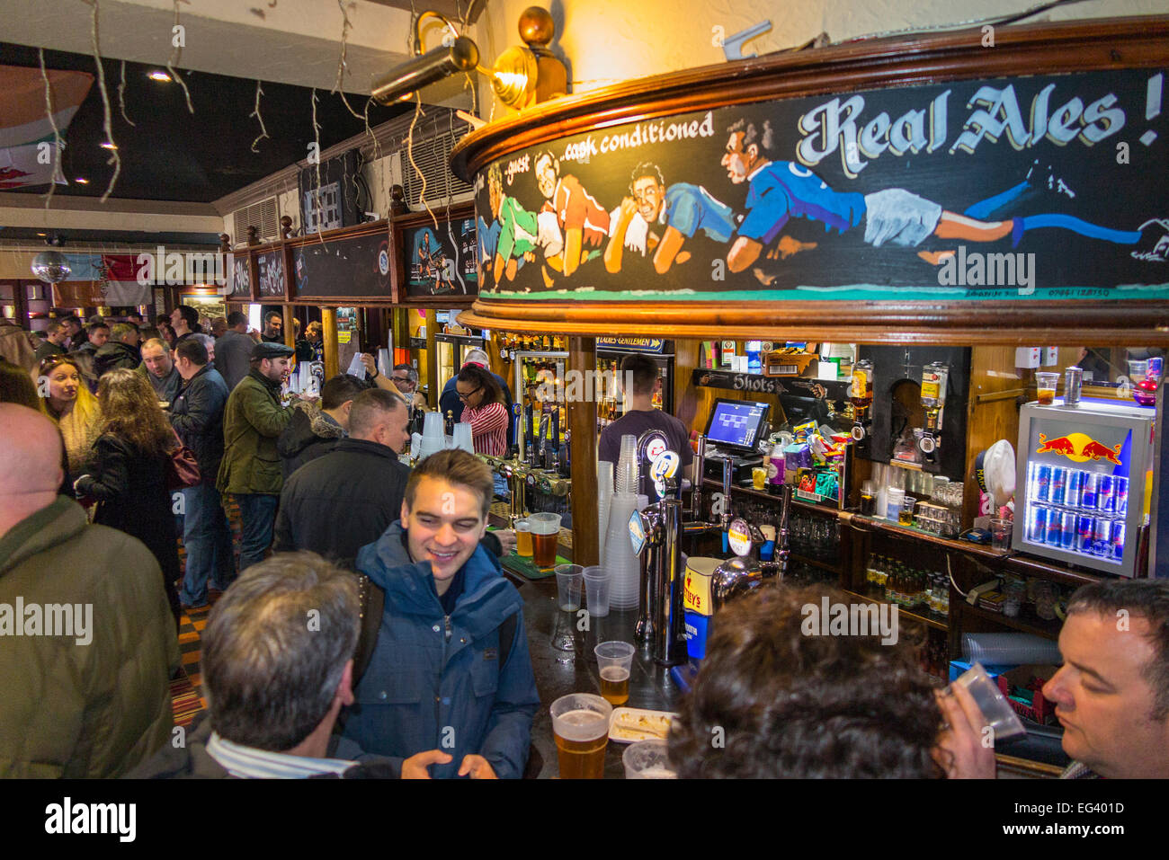 Rugby fan at bar inside The Misty Moon pub / public house / tavern. Twickenham UK; popular with Rugby fans on match days Stock Photo