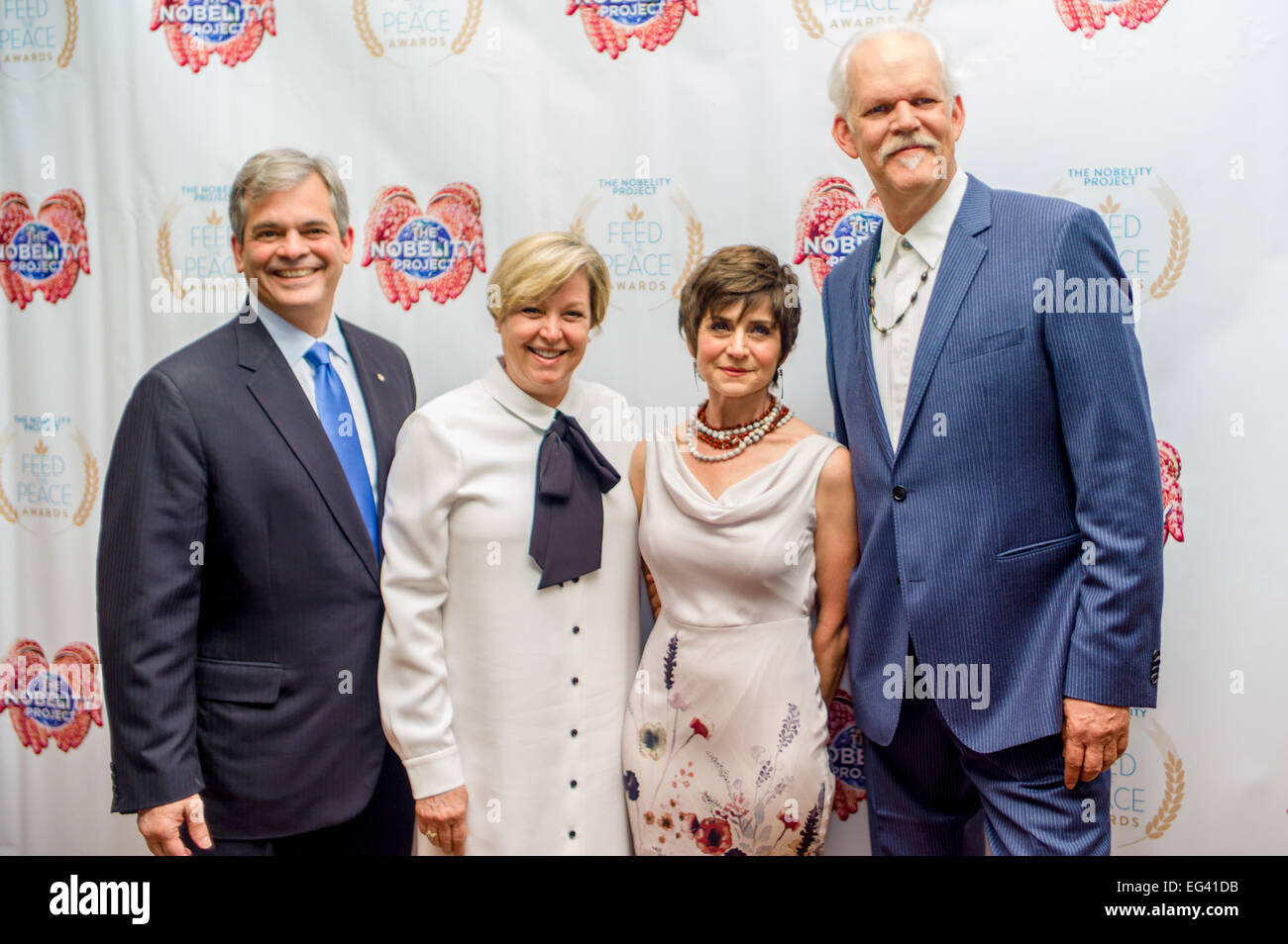Austin, Texas, USA. 15th Feb, 2015. From left to right: Austin, Texas mayor Steve Adler, with his wife Diane Land, Christie Pipkin Executive Director of The Nobelity Project and Turk Pipkin founder of The Nobelity Project. The Nobelity Project partners with communities to bring education to all by providing classrooms, libraries, computers, books, clean water, health support, information centers, and student scholarships to those in need. Currently investing in student success in Kenya, Honduras, Nepal, and the US. Credit:  J. Dennis Thomas/Alamy Live News Stock Photo