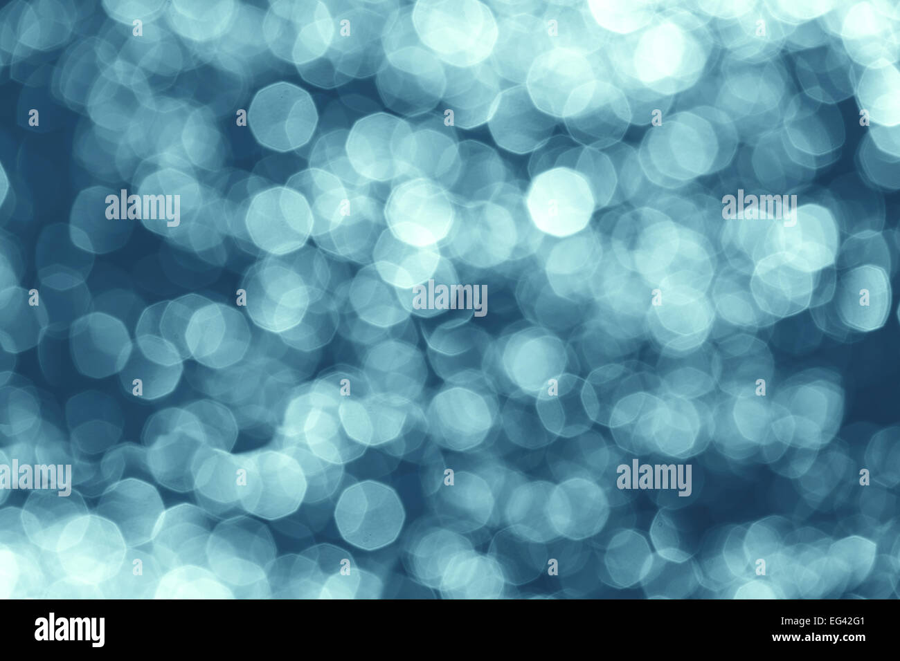 Abstract background made of water reflection bokeh circles. Stock Photo
