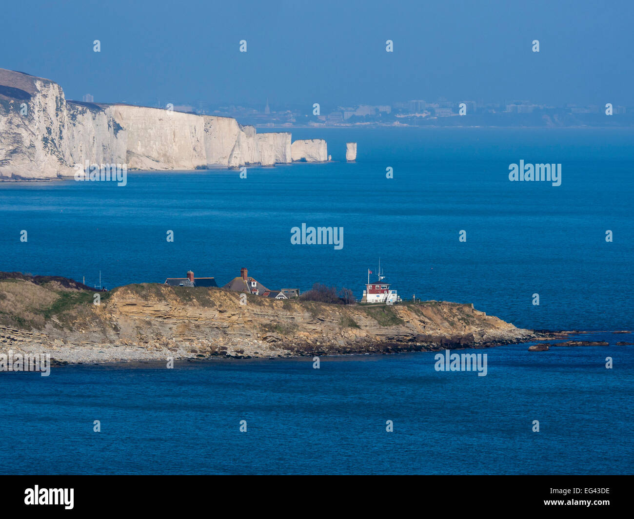 Peveril Point with the Coastguard Station in the foreground and Ballard Cliff in the background, Swanage Bay, Dorset, England, UK Stock Photo