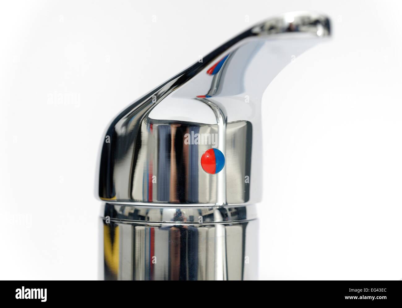 A red and blue indicator on a domestic kitchen tap red for hot and blue for cold England UK Stock Photo