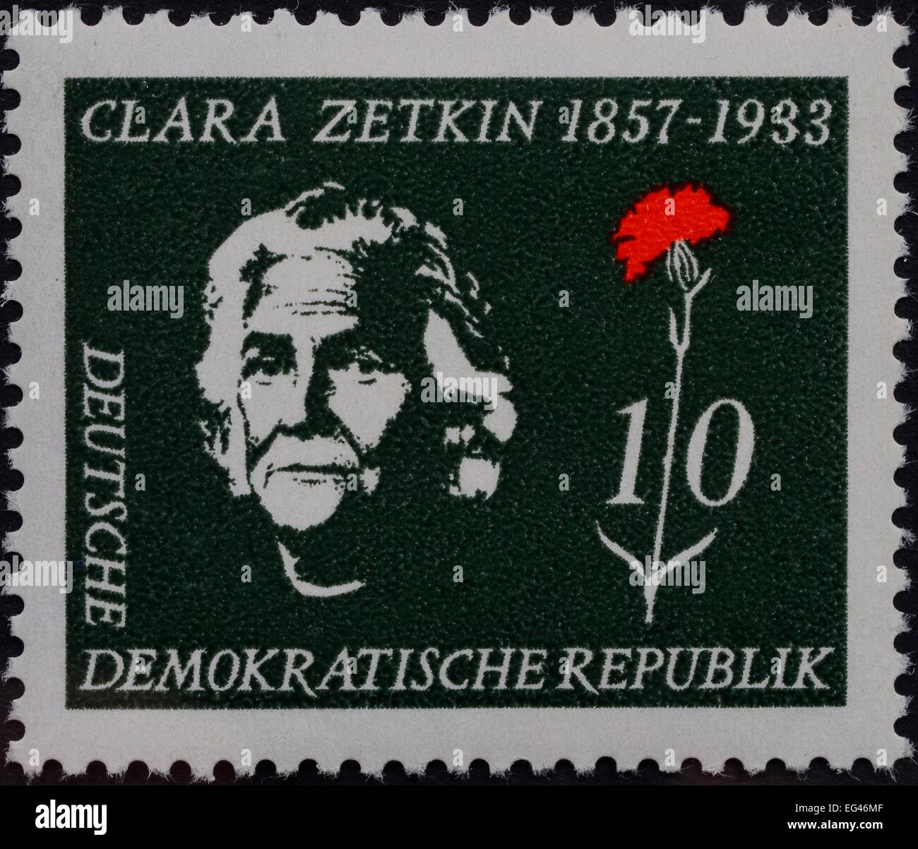 CRMara Zetkin, a German Marxist theorist, activist, and advocate for women's rights, 1911, portrait on a stamp, GDR, 1957 Stock Photo