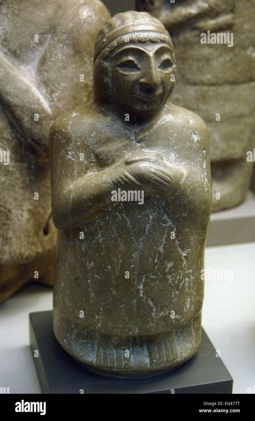 Mesopotamia. Limestone statue of a woman. Kingdom of Lagash. 2500BC. From Tello (ancient Girsu). Iraq. Probably a votive donation in a temple. British Museum. London. England. United Kingdom. Stock Photo
