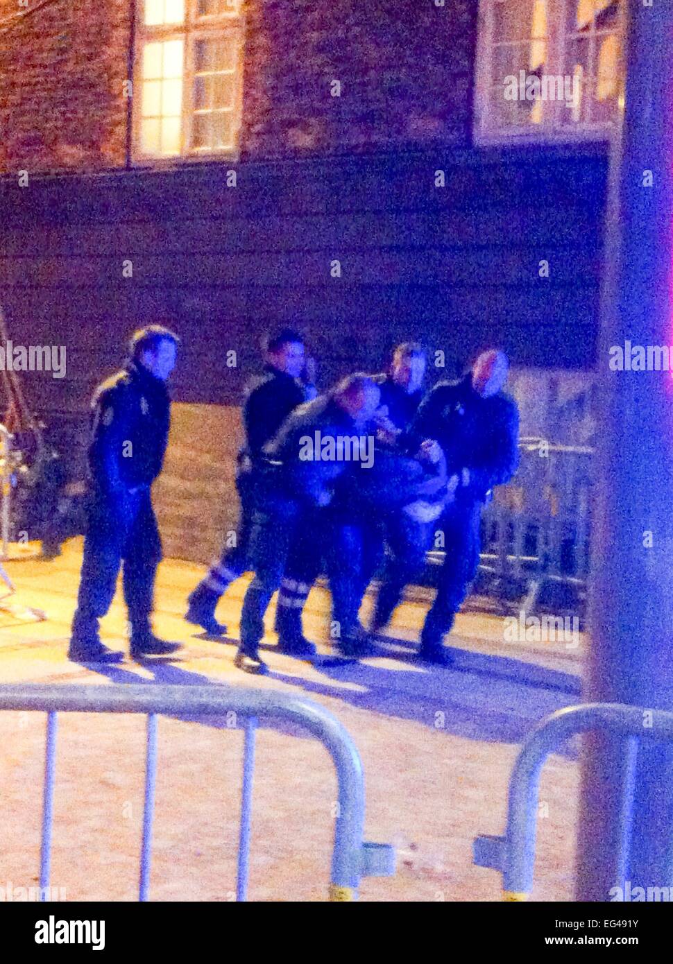 Copenhagen, Germany. 15th Feb, 2015. Police officers arrest a man after ...
