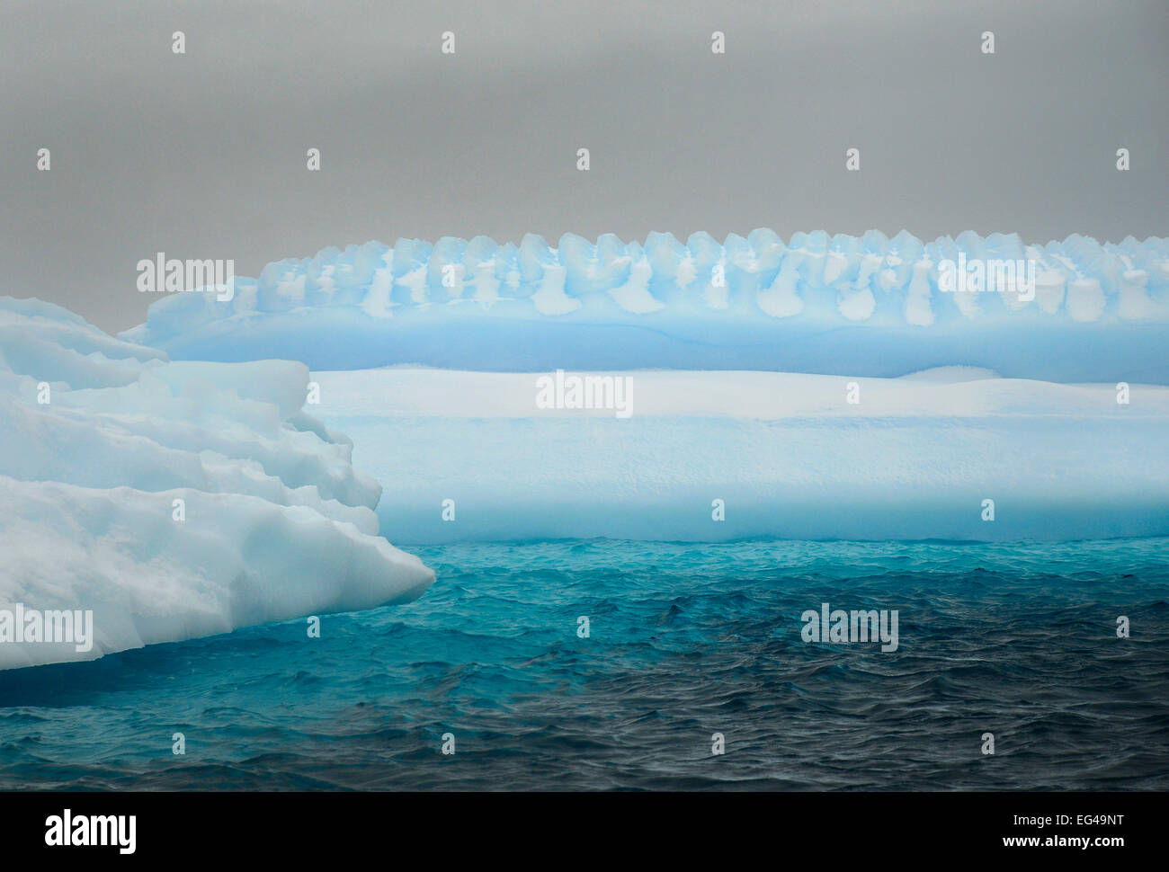 Icebergs in Iceberg Alley Pleneau Island Antarctica. Stock Photo