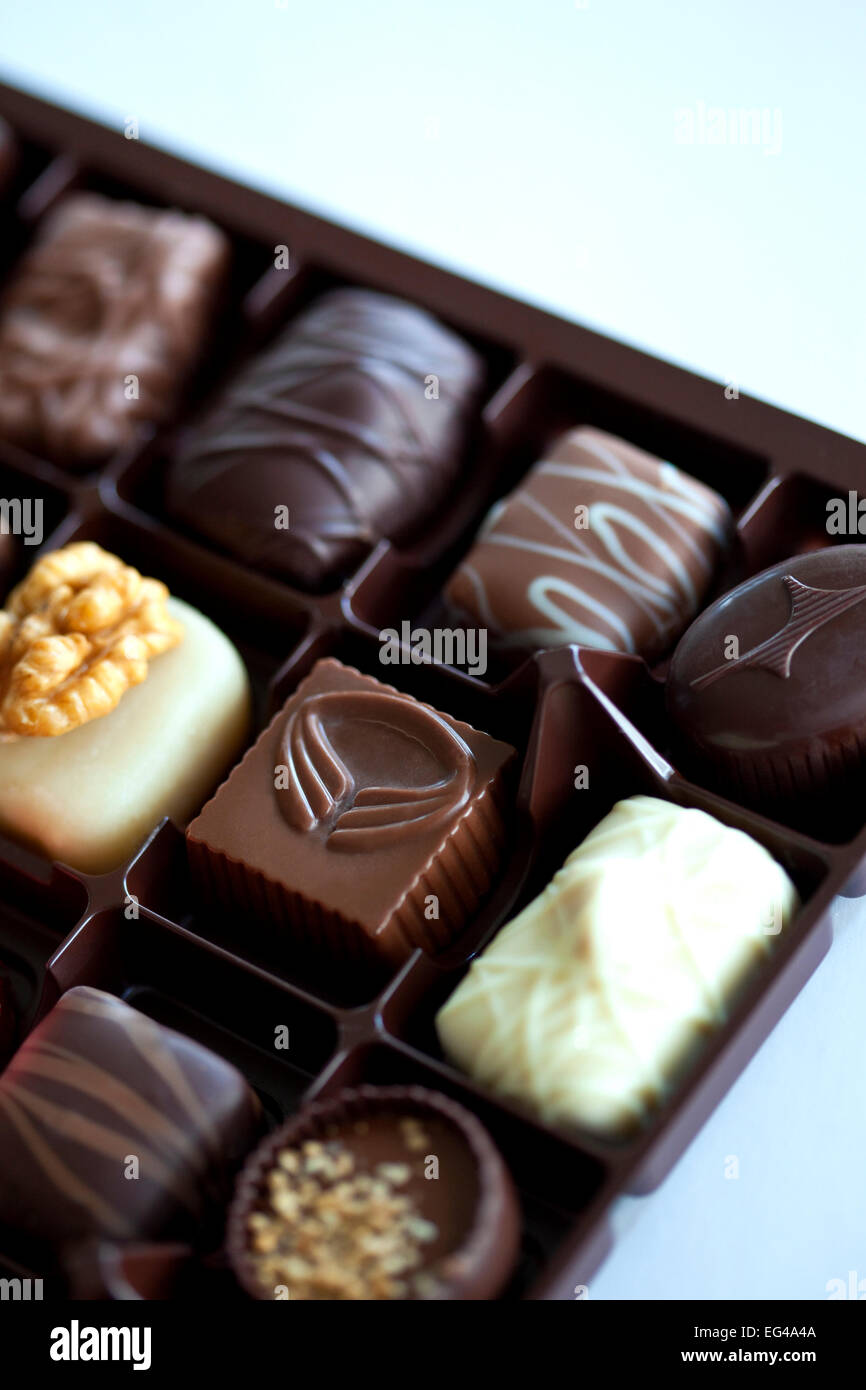 Chocolate candies in a box Stock Photo Alamy
