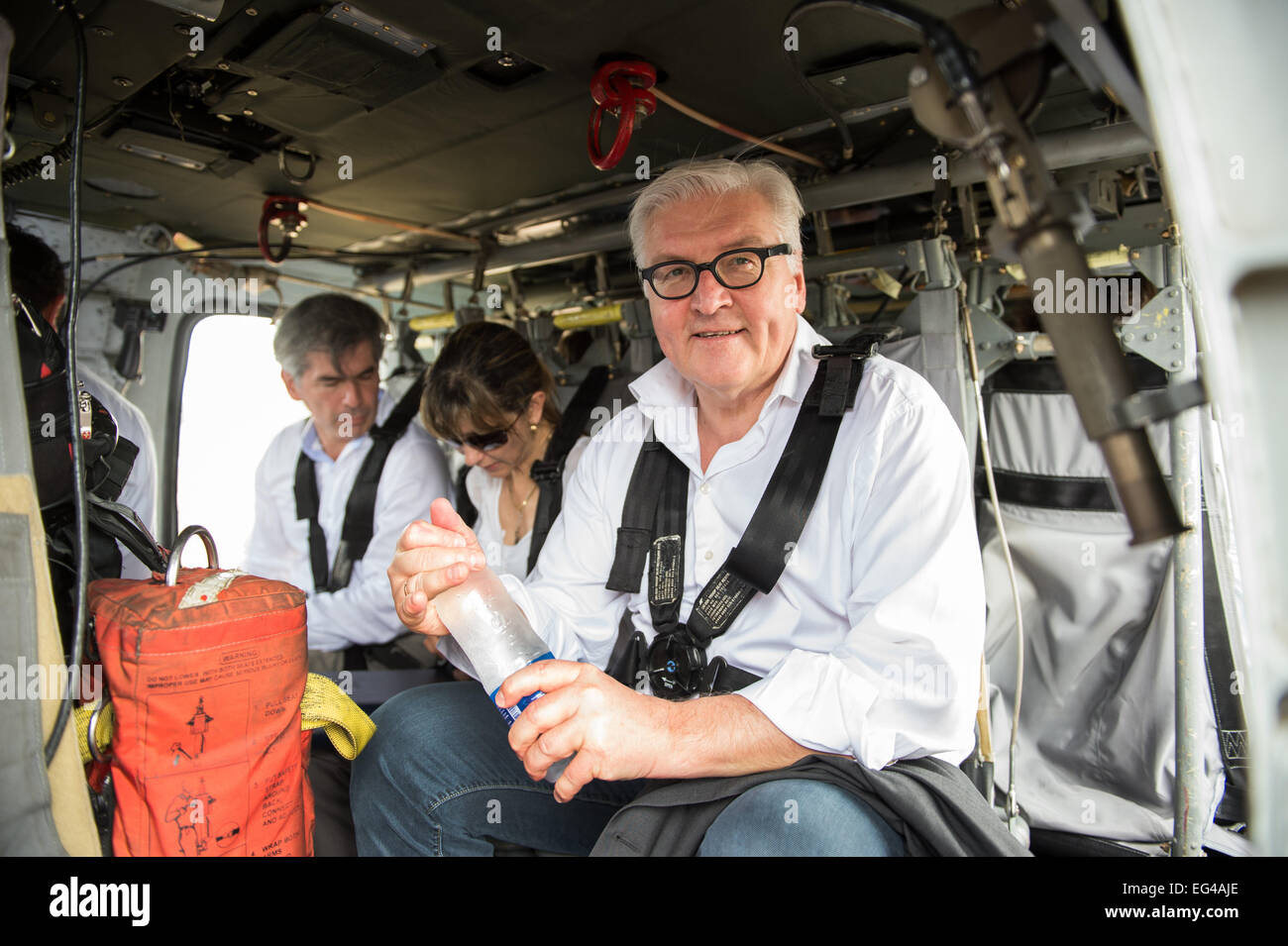 Santa Marta, Colombia. 15th Feb, 2015. German Foreign Minister Frank-Walter Steinmeier (SPD, R) sits next to Colombian Minister of Justice Yesid Reyes Alvarado (l) and the Colombia'S Deputy Forein Minister Patti Londono Jaramillo (M) as they sit in a military helicopter o in Santa Marta, Colombia, 15 February 2015. Steinmeier was on his way to visit a coffee plantation and processing plant of the indigenous community of Kogis during his official visit to Colombia. Photo: Bernd Von Jutrczenka/dpa/Alamy Live News Stock Photo