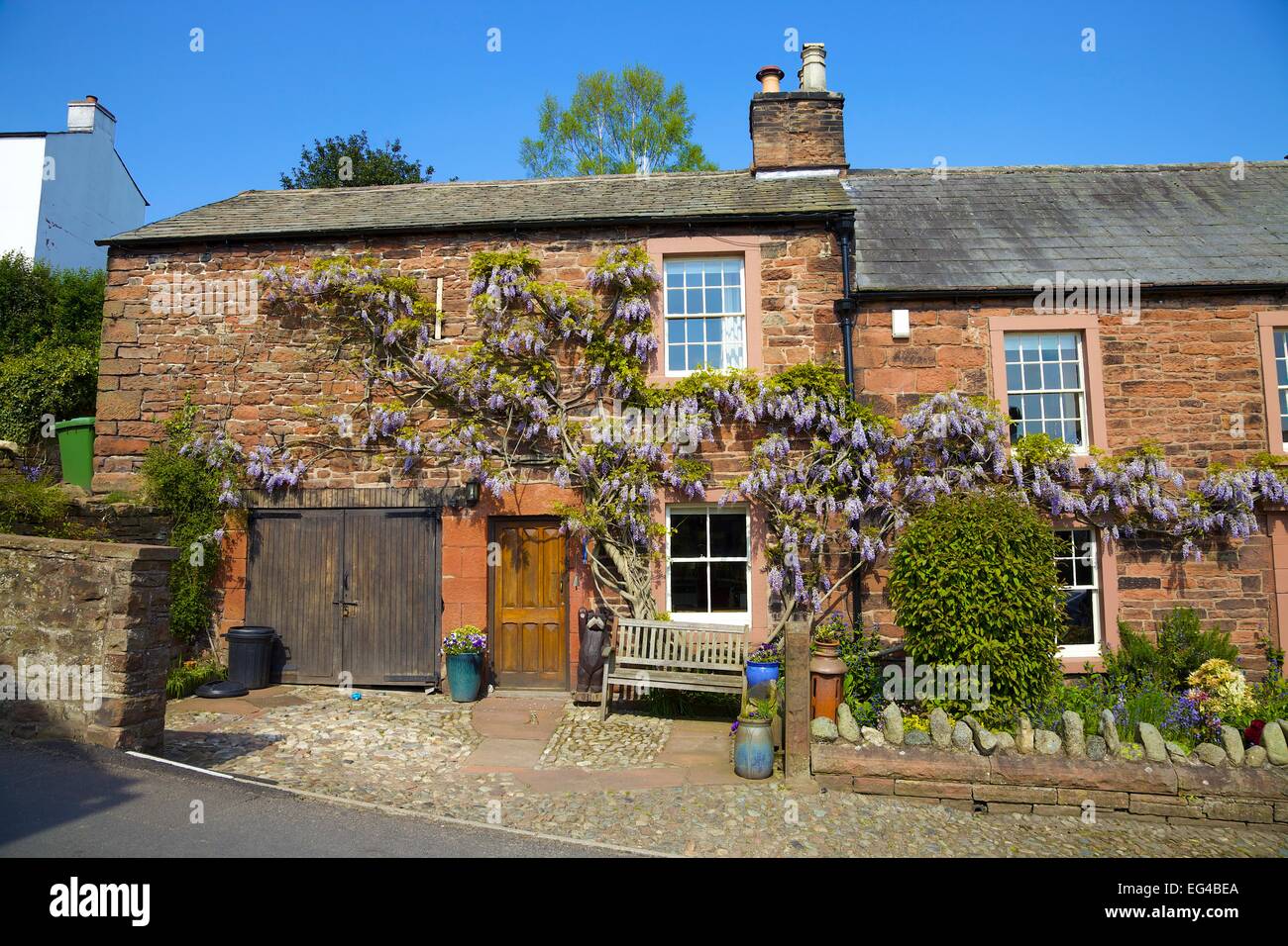 Sandstone house. Kirkoswald, Eden Valley, Cumbria, England, UK Stock