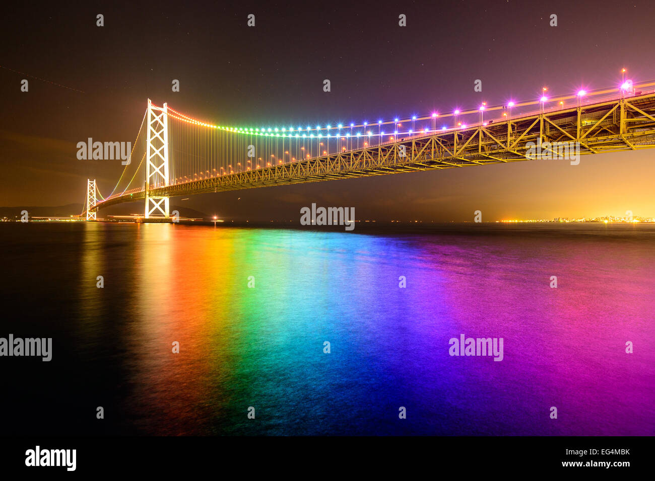 Rainbow lights on Akashi Ohashi (Pearl Bridge) in Kobe, Japan. Stock Photo