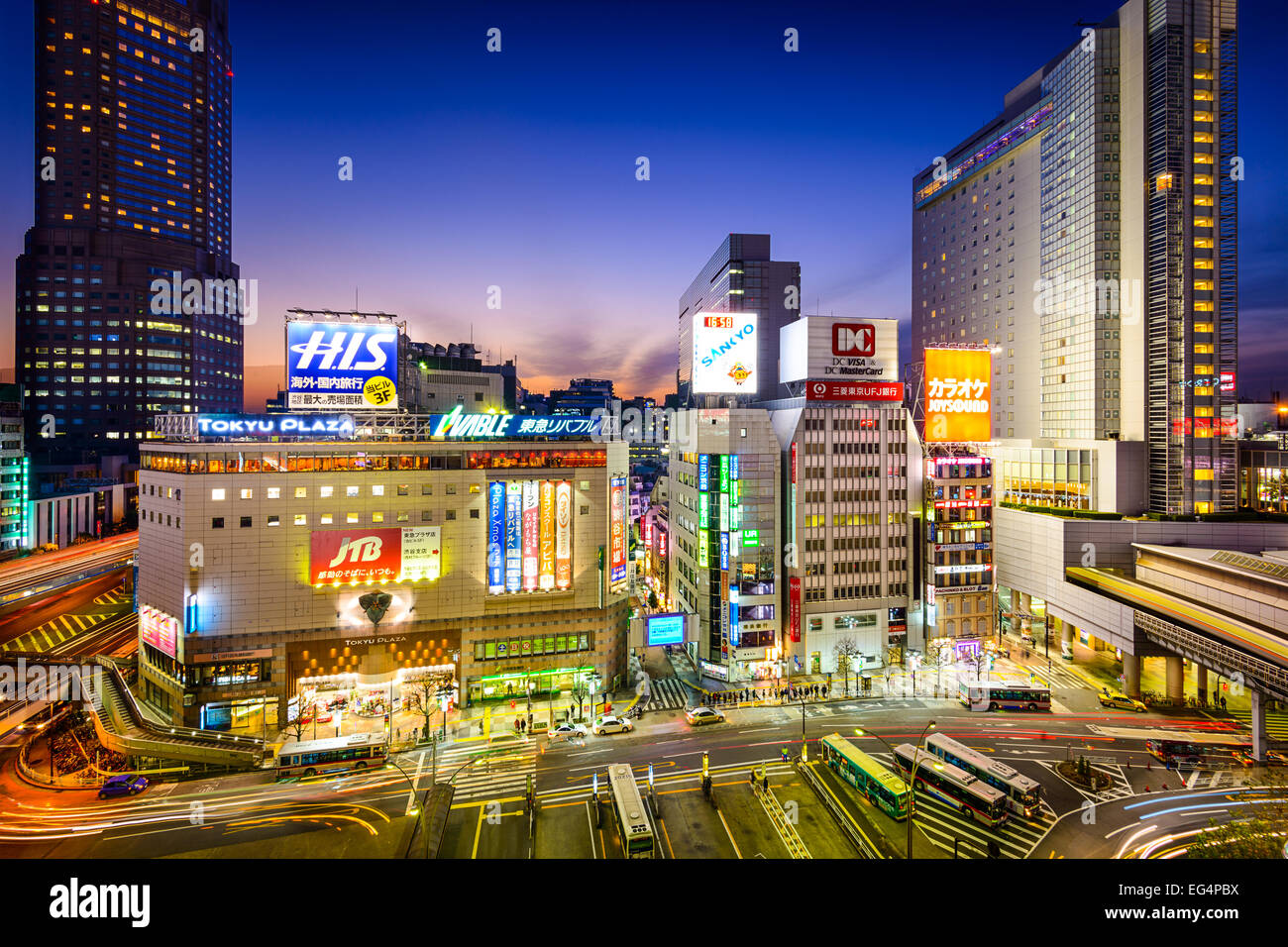 Shibuya district cityscape at twilight. The district is one of the 23 special wards of Tokyo and known as a center of youth. Stock Photo