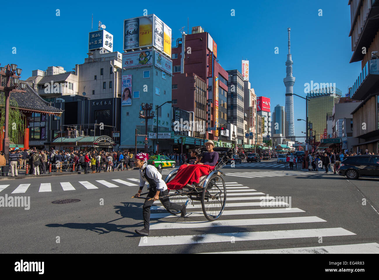 TOKYO, JAPAN - November, 23, 2014: Tokyo sightseeing by rickshaw tour, Asakusa historic district Stock Photo