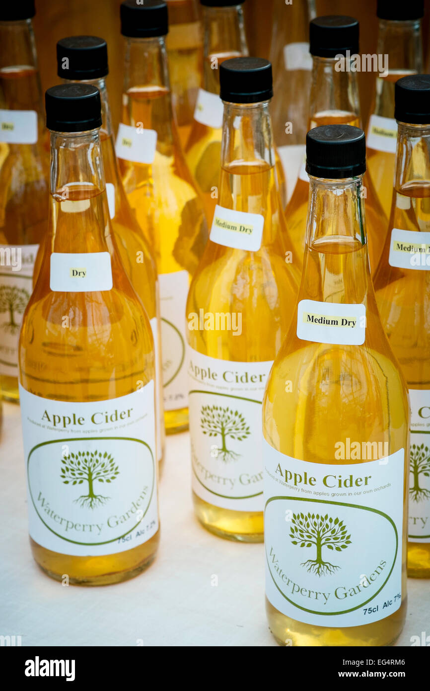 Bottles of labeled apple cider, Waterperry gardens Stock Photo