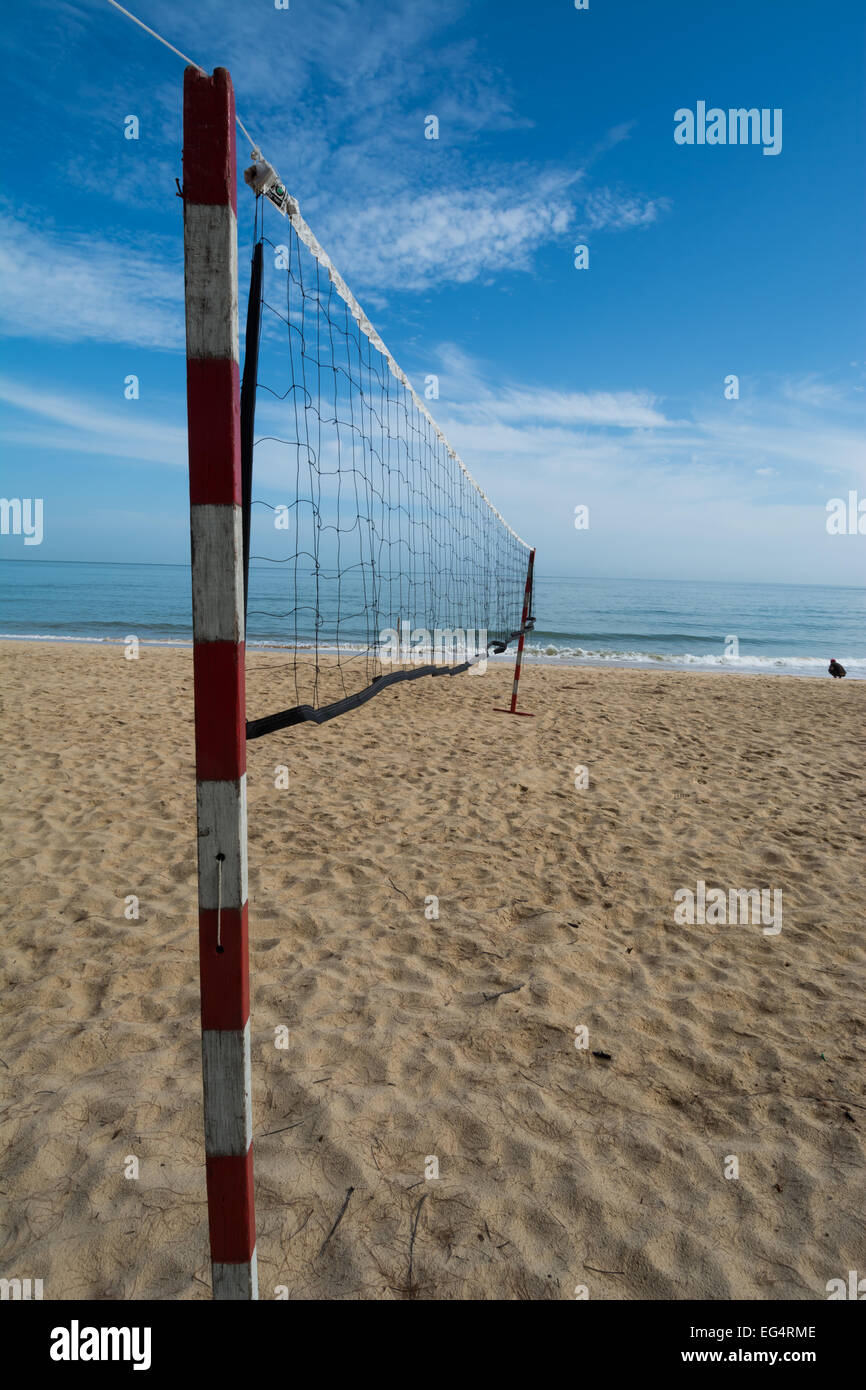 Netball Beachball net on a tropical beach with perspective Stock Photo