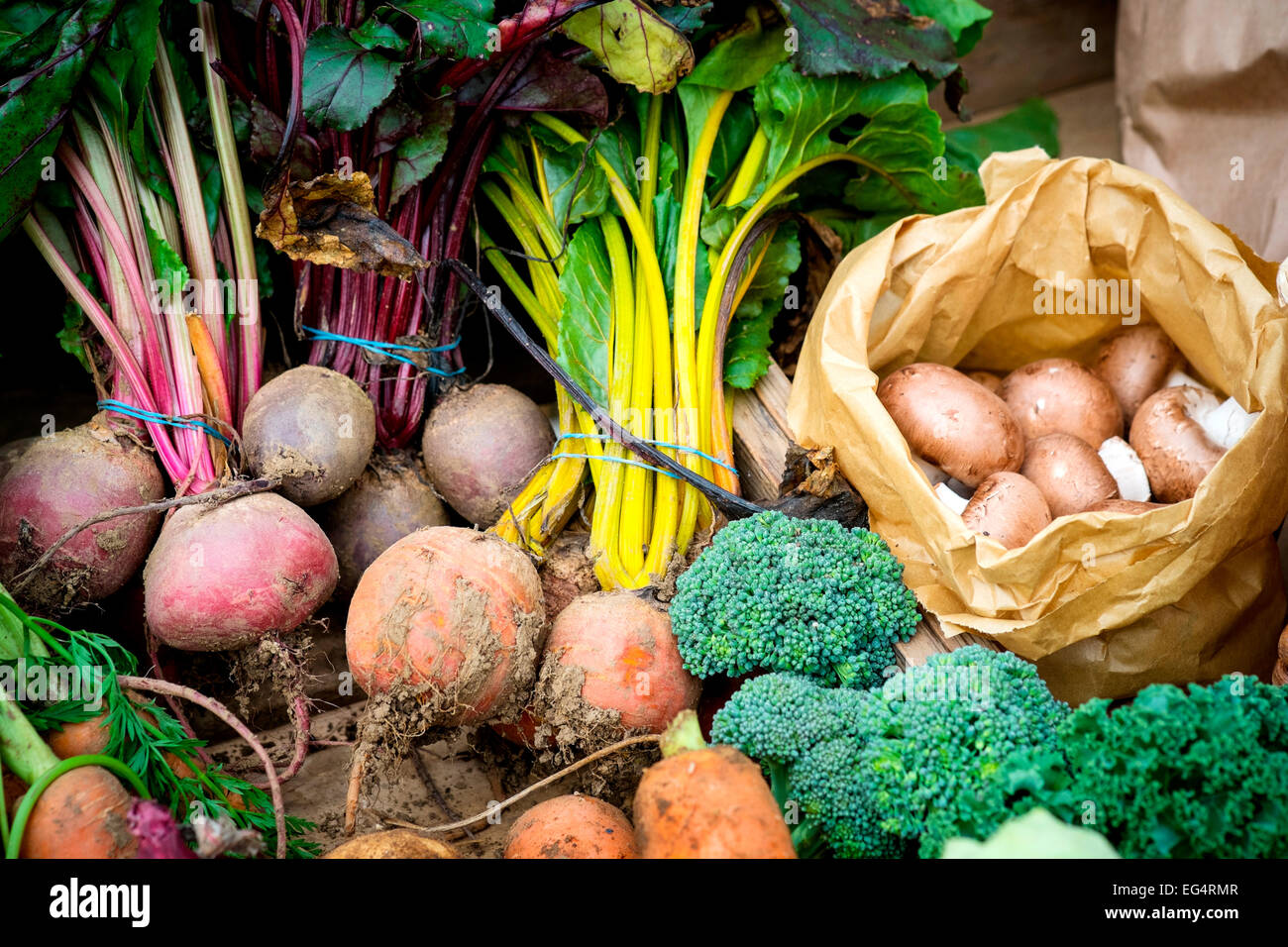 Variety of local fresh vegetables on farmers market stall, Isles of Scilly, UK Stock Photo