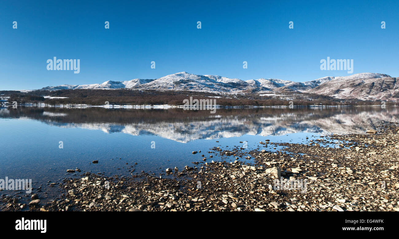 Coniston Old Man and Coniston Water in the snow Stock Photo
