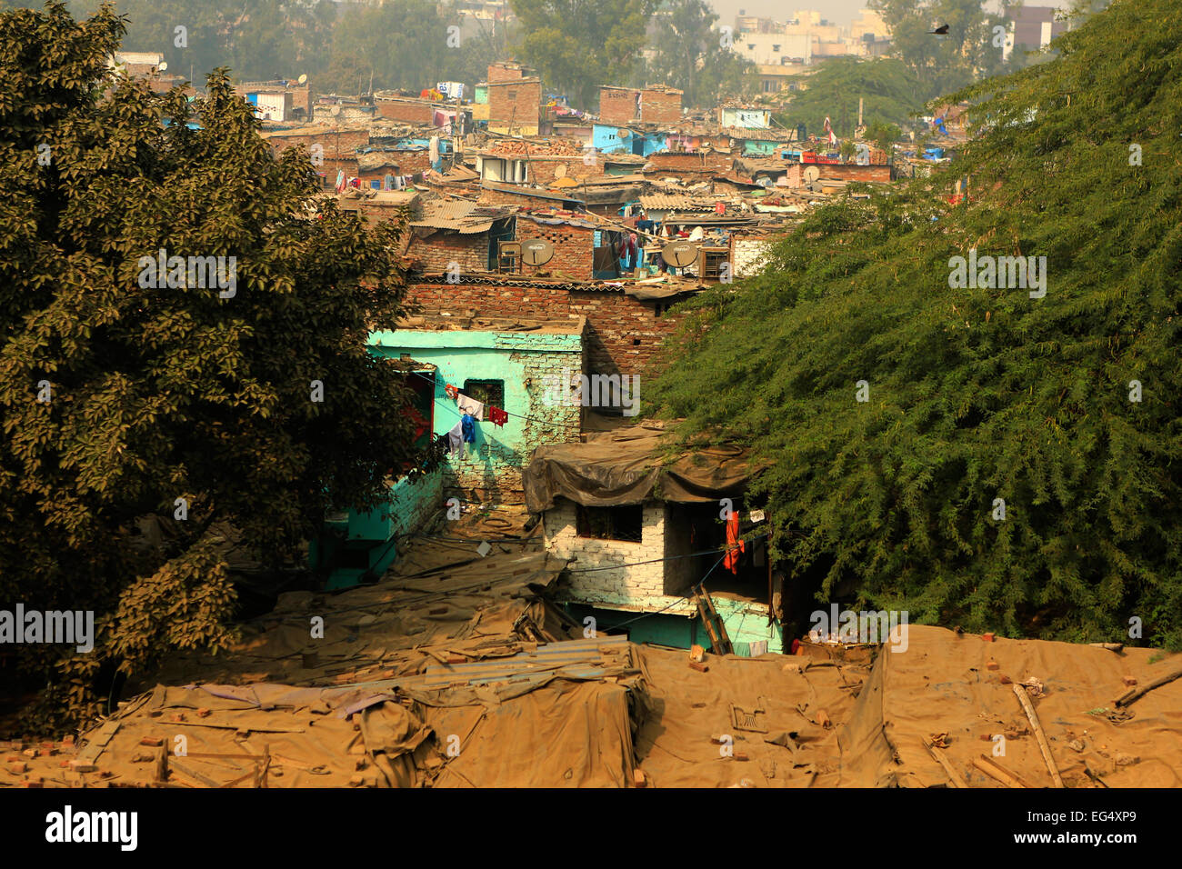 Ghetto and slums in Delhi India.These unidentified people live in  a very  difficult conditions Stock Photo