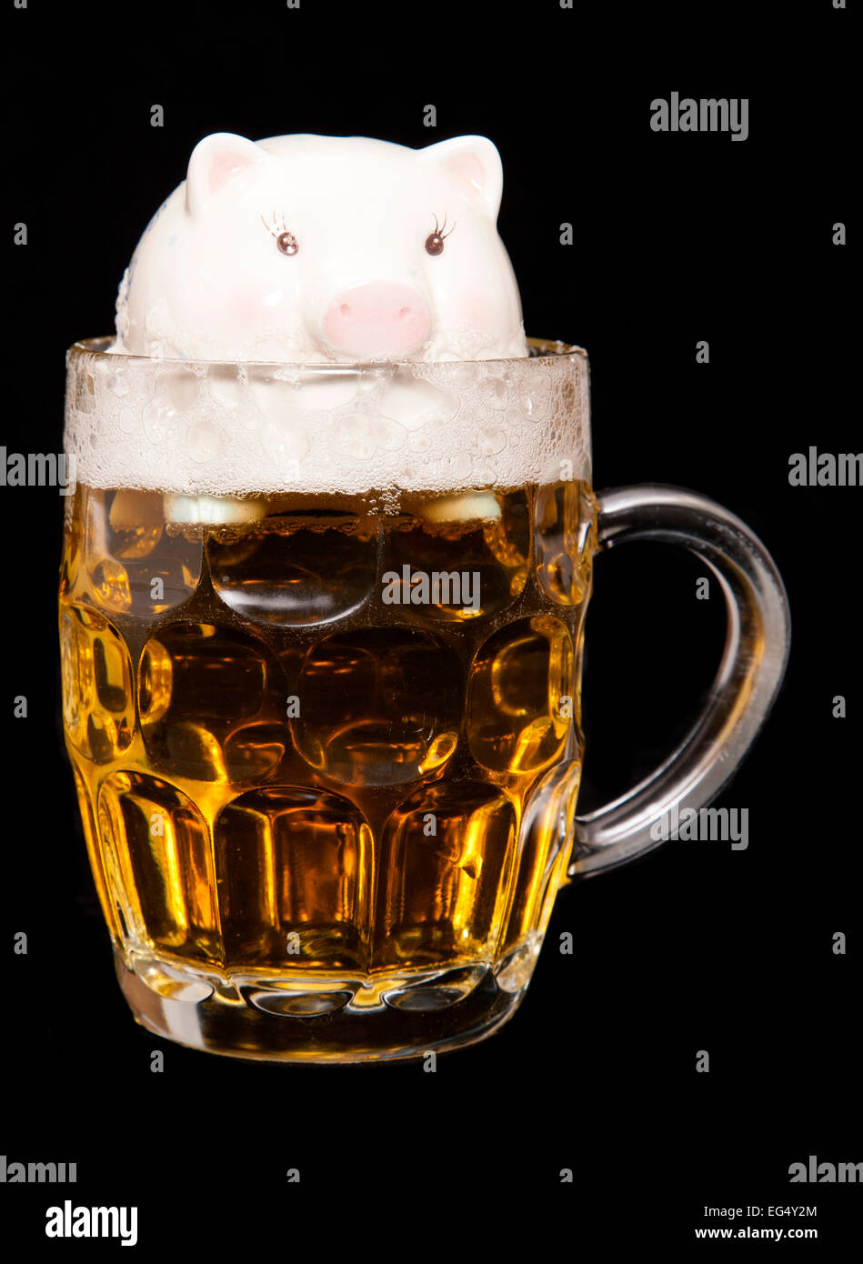 drowning in debt from drinking cutout Stock Photo