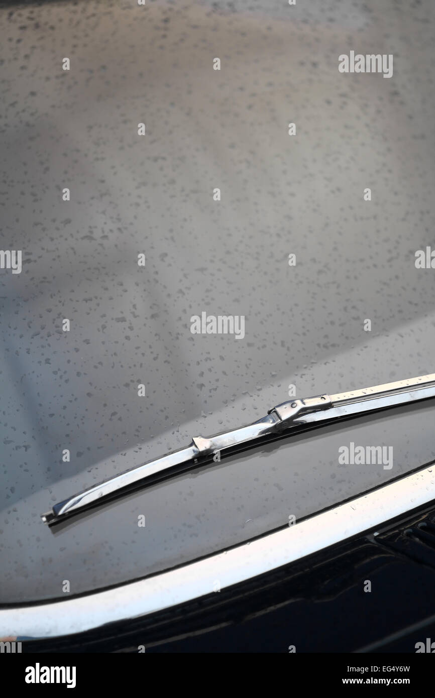 Color vertical shot of a vintage car screen wiper. Stock Photo