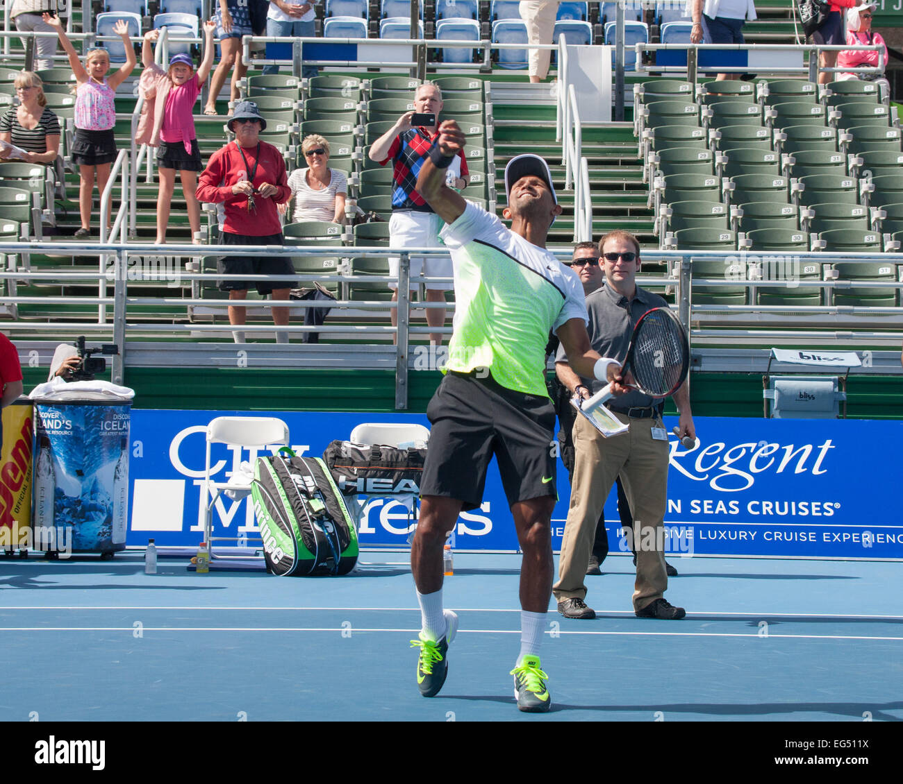 Delray Beach, Florida, US. 16th Feb, 2015. In the ATP World Tour International men's doubles round 1, RAVEN KLASSEN of South Africa throws a ball into the stands after he and LEANDER PAES (IND) defeated MALEK JAZIRI (TUN) and MARINKO MATOSEVIC (AUS) 6-3, 7-6. Credit:  Arnold Drapkin/ZUMA Wire/Alamy Live News Stock Photo