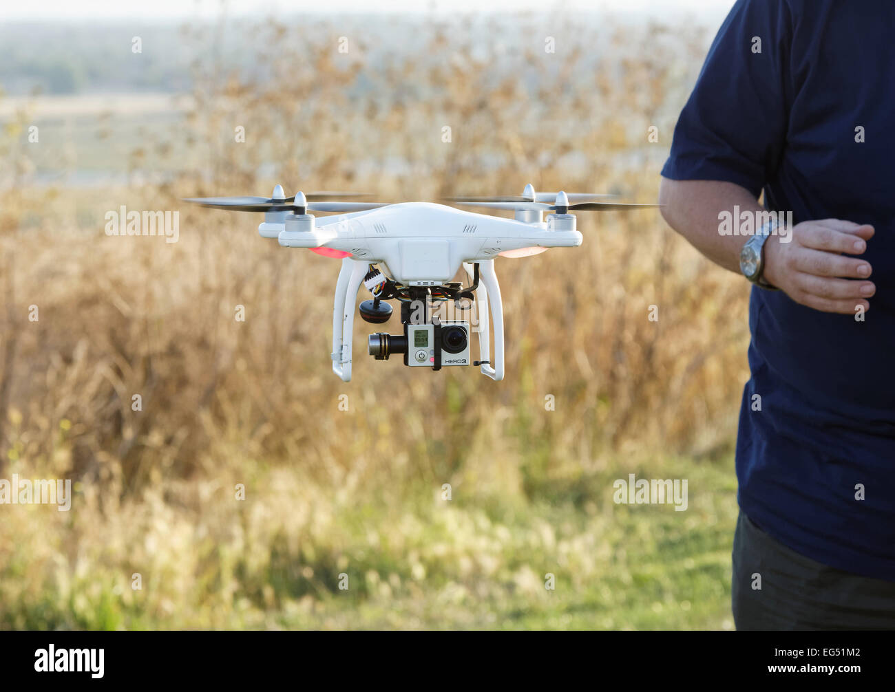 small drone / multicoptor flying with GoPro video camera Stock Photo